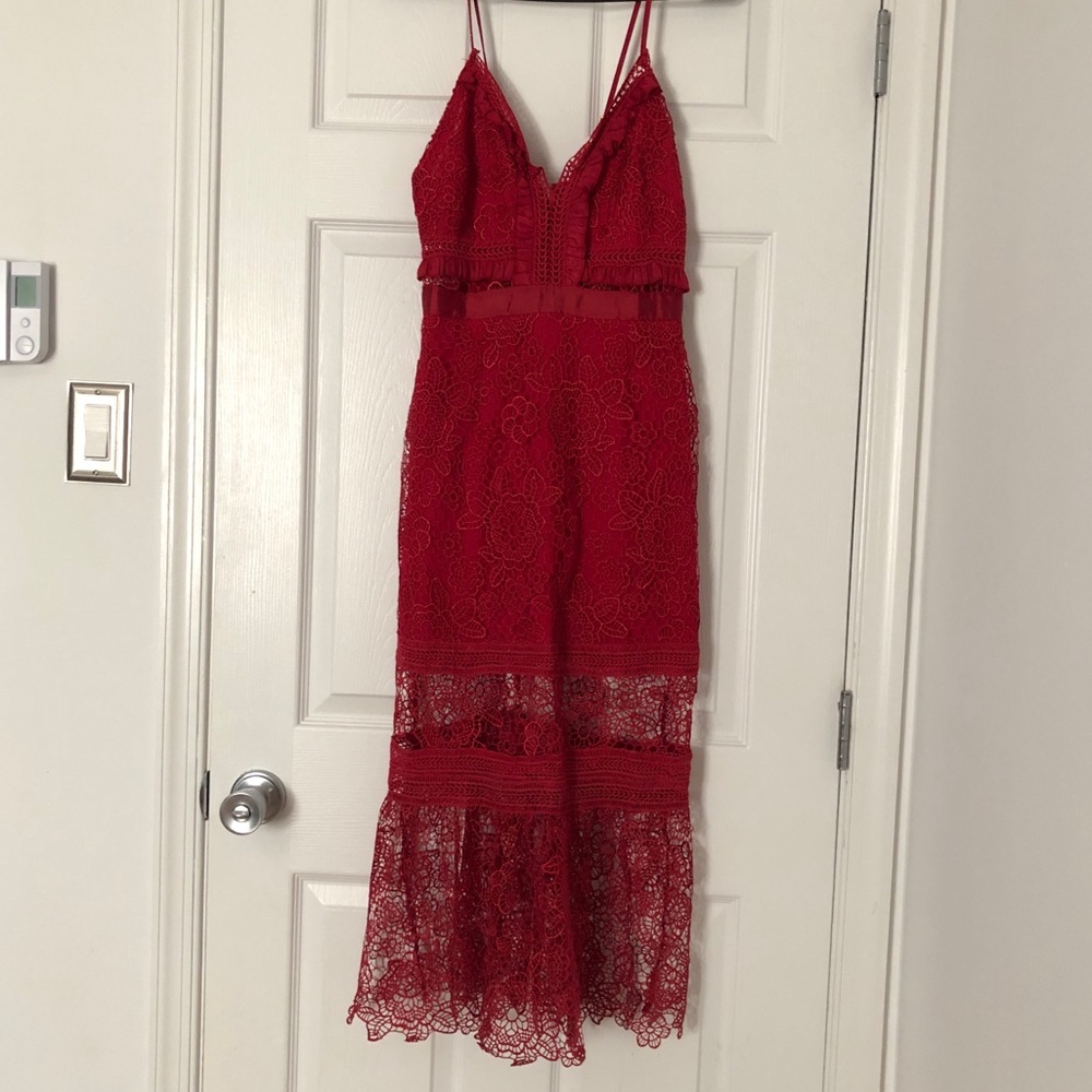 Red embroidered dress.